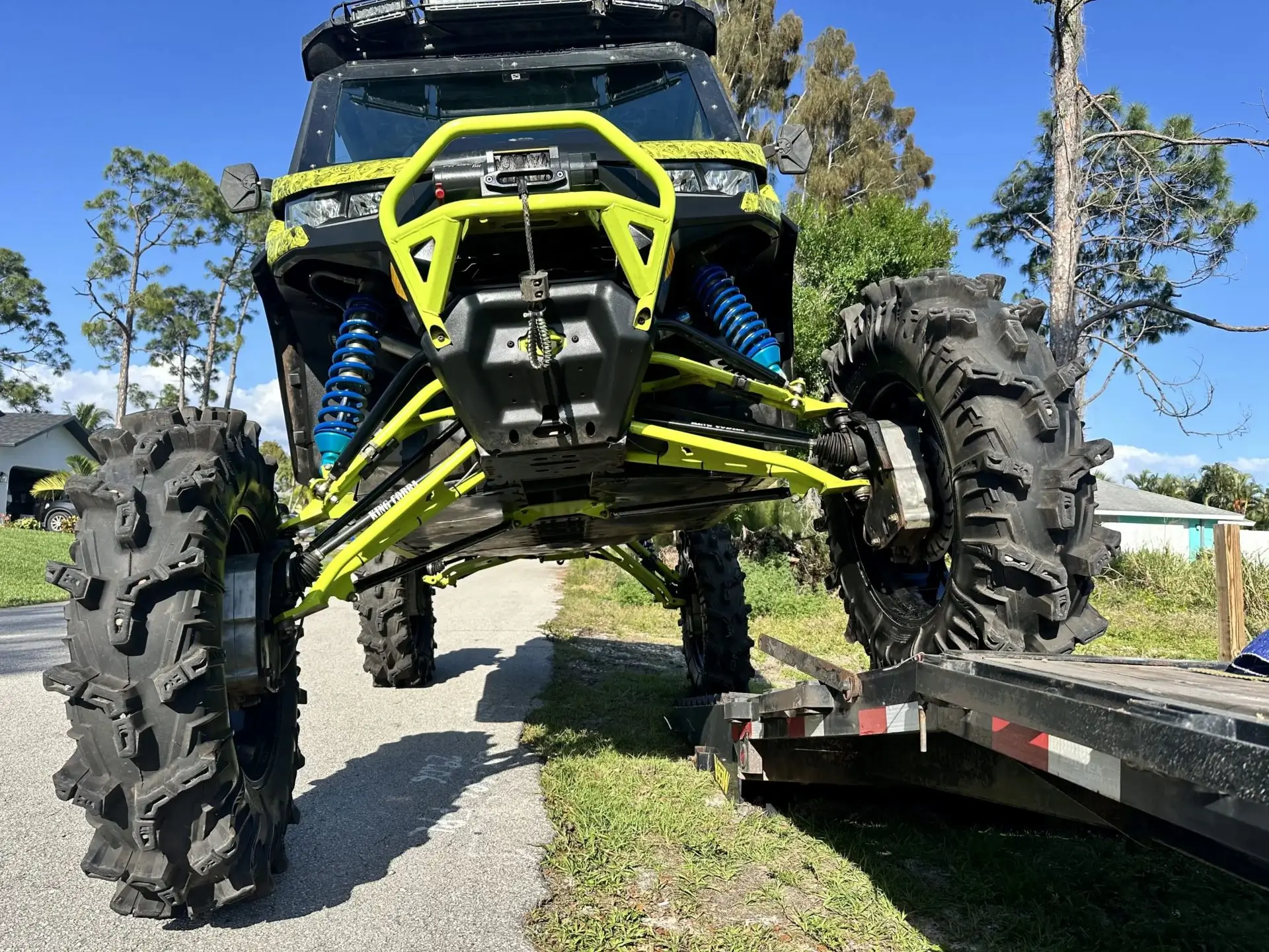 A large truck with four tires on it's trailer.